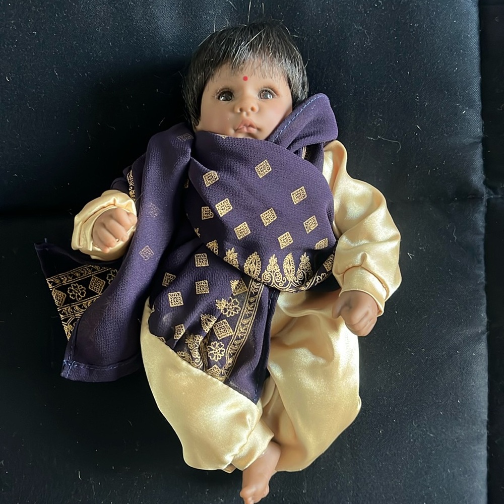 Lee Middleton Doll, India with stand.  No box.  New condition